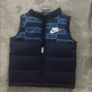 Nike Navy and Blue Kids Puffer Vest with 'Just Do It' Print